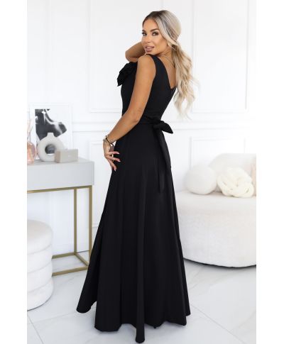 Abito lungo elegante nero con fiore decorativo e scollo a V – Nayla - gogolfun.it